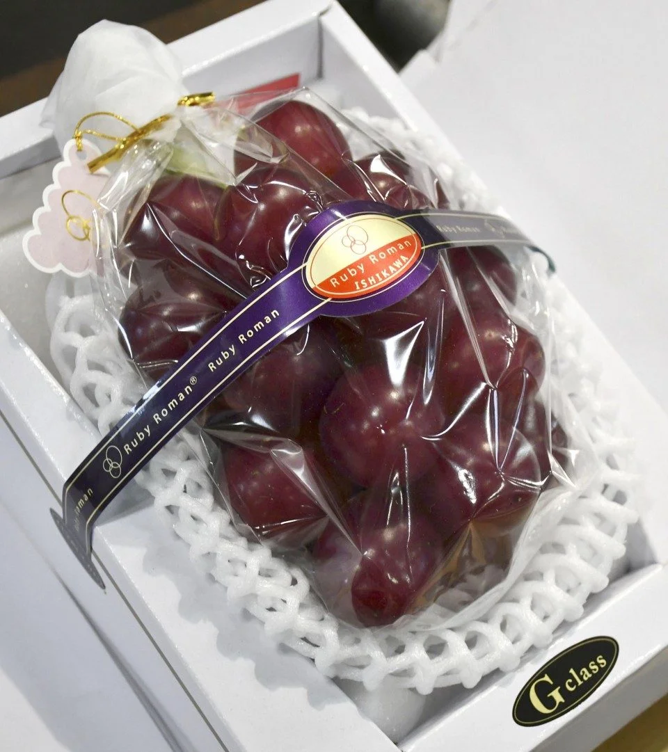Bunch of red Japanese grapes sold for $11,000 at auction