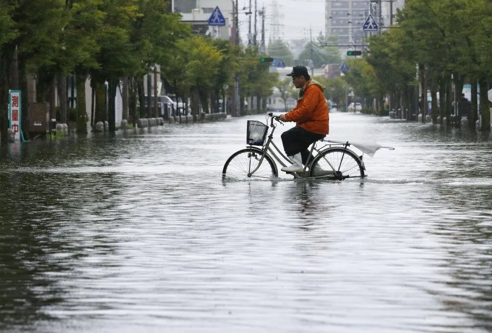 IN PHOTOS: Torrential rain floods southwestern Japan