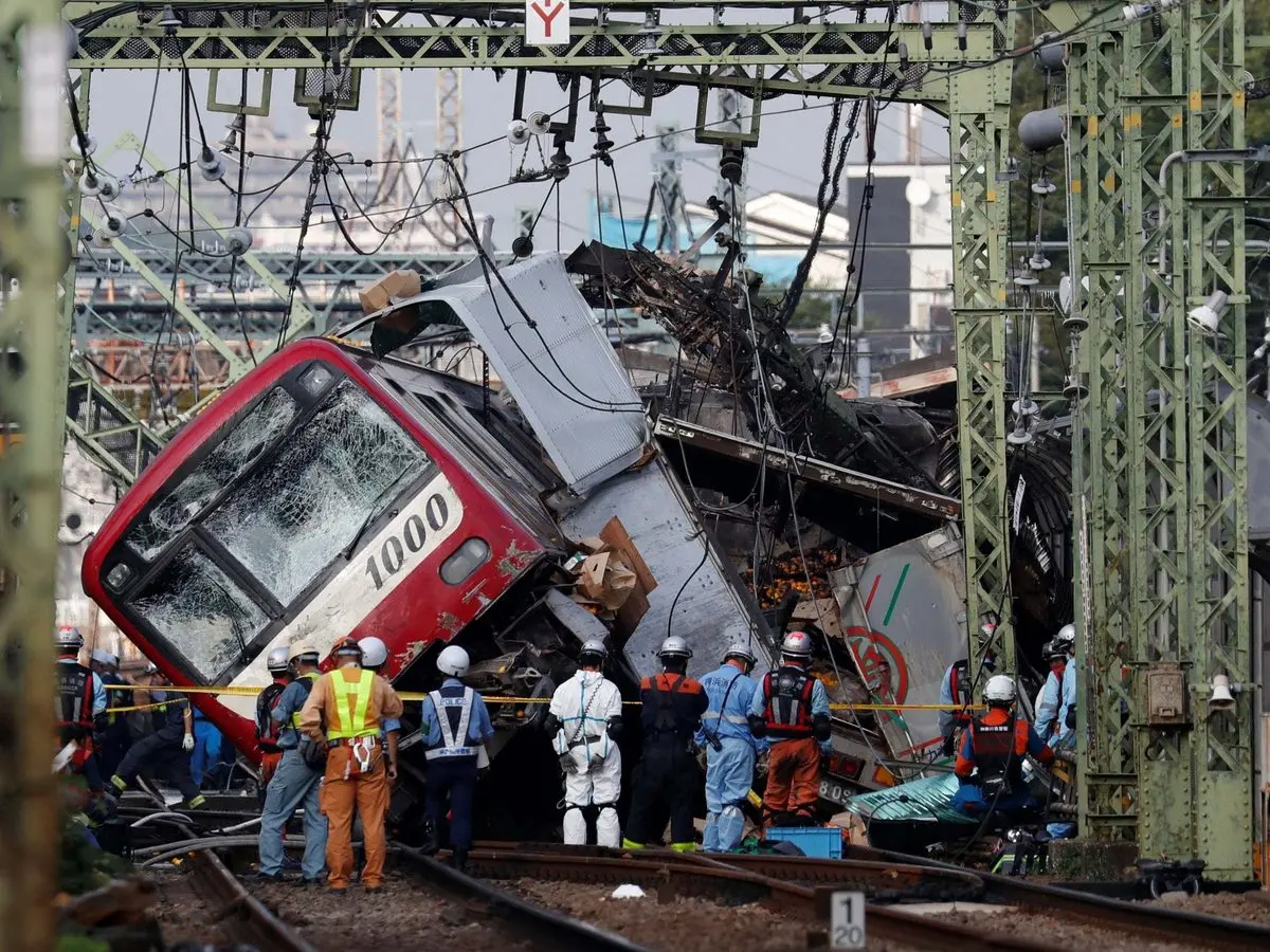 Japan train crash: Passenger express in fatal collision with fruit truck at level crossing in Yokohama