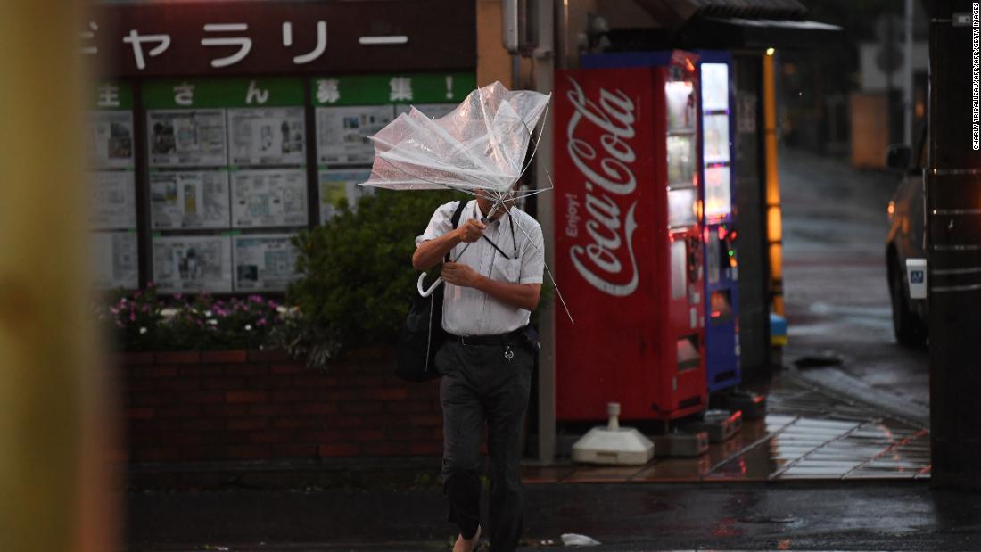 Japan typhoon leaves 100 flights canceled and 1 million without power