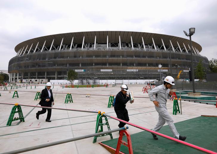 Japanese firms brace for economic contraction after Olympics