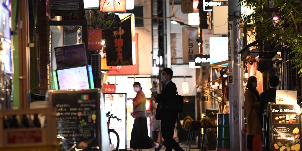 Tokyo keeps bars and barbers open during coronavirus emergency